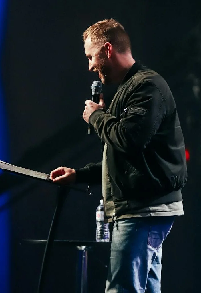 Man in Black Leather Jacket Singing